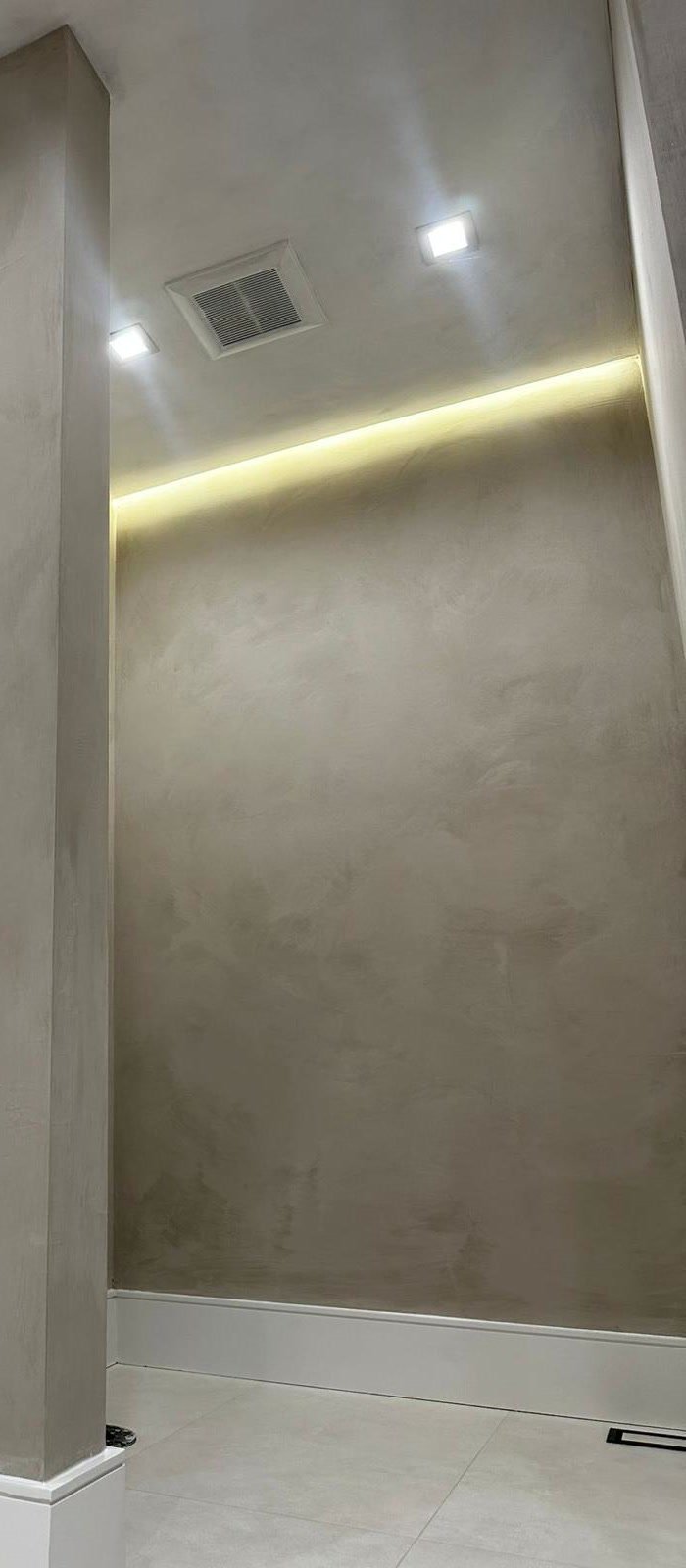 Microcement architectural column in taupe — seamless modern cement-based finish, SoHo loft by MarkOn® Walls
