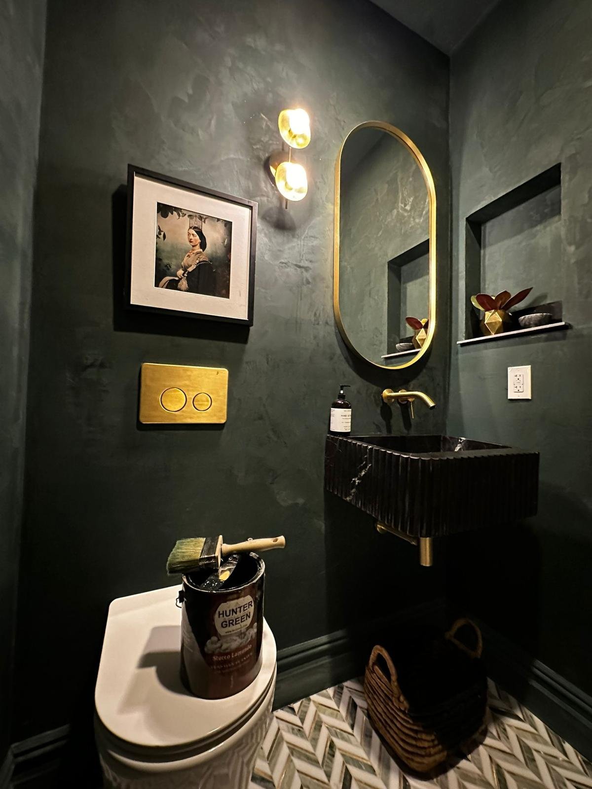 Hunter-green mirror-polished Venetian plaster powder room with brass mirror, Park Avenue — MarkOn® Walls / Vlad Markov
