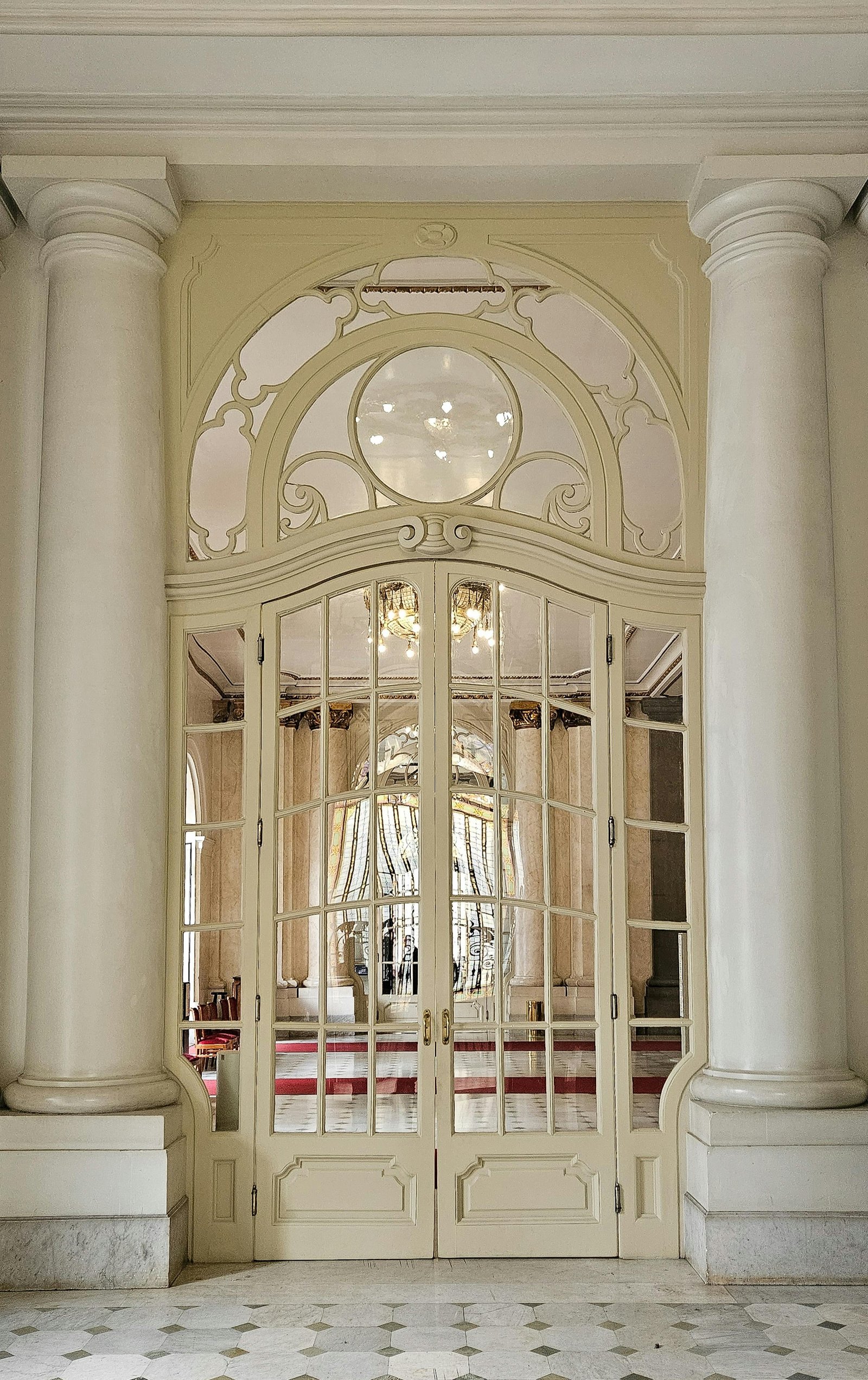 Beaux-Arts plaster doorway with hand-gilded acanthus cornice — MarkOn® Walls heritage restoration