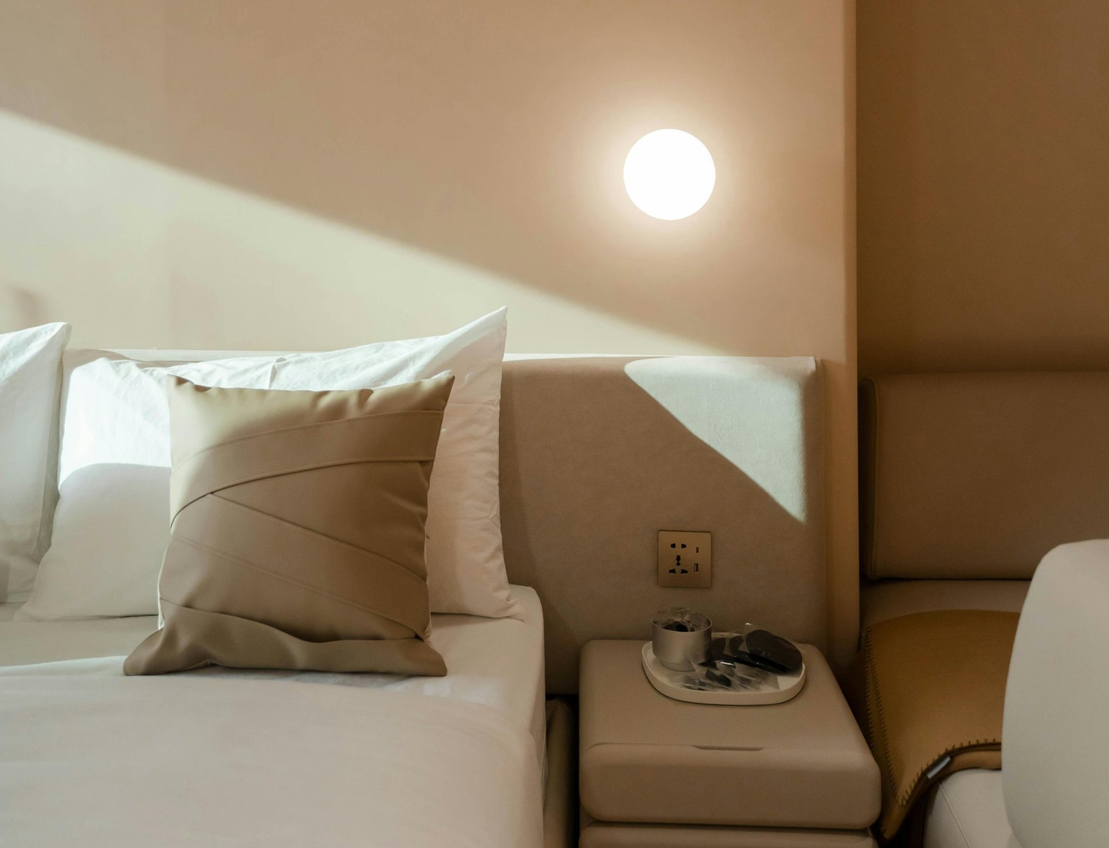 Boutique hotel guestroom with hand-finished mineral plaster walls — MarkOn® Walls hospitality work